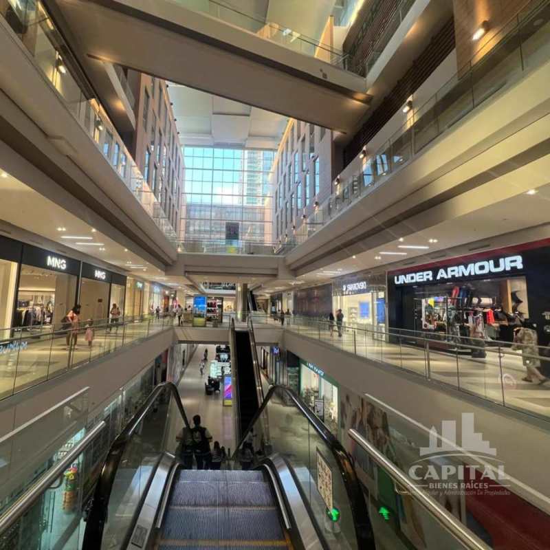 Shopping center interior with escalators stores Town Center Costa del Este Panama
