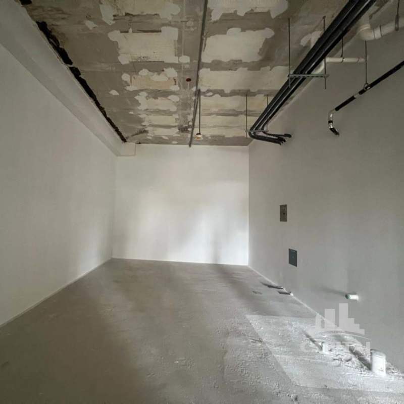 Bare concrete commercial interior with visible utilities for sale Panama