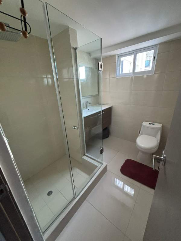 Bathroom with glass enclosed shower and modern finishes PH Villa de las Fuentes Panama