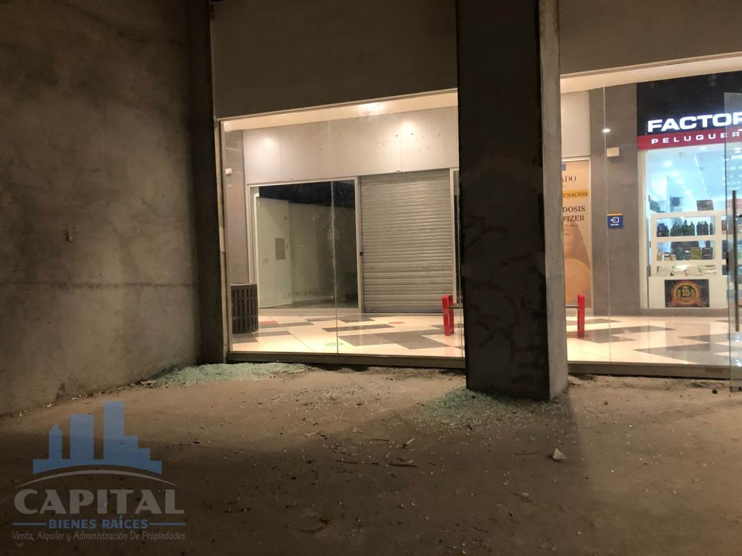 Unfinished shop unit with glass storefront in Dorado Mall Panama City for commercial leasing