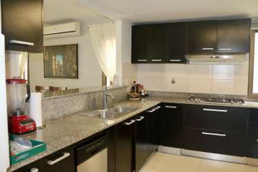 Covered terrace with garden in eco-friendly house for rent in Woodlands Panama Pacifico