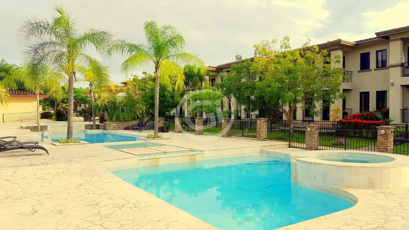 Large master bedroom with balcony, ensuite bathroom, walk-in closet Embassy Club Clayton rental