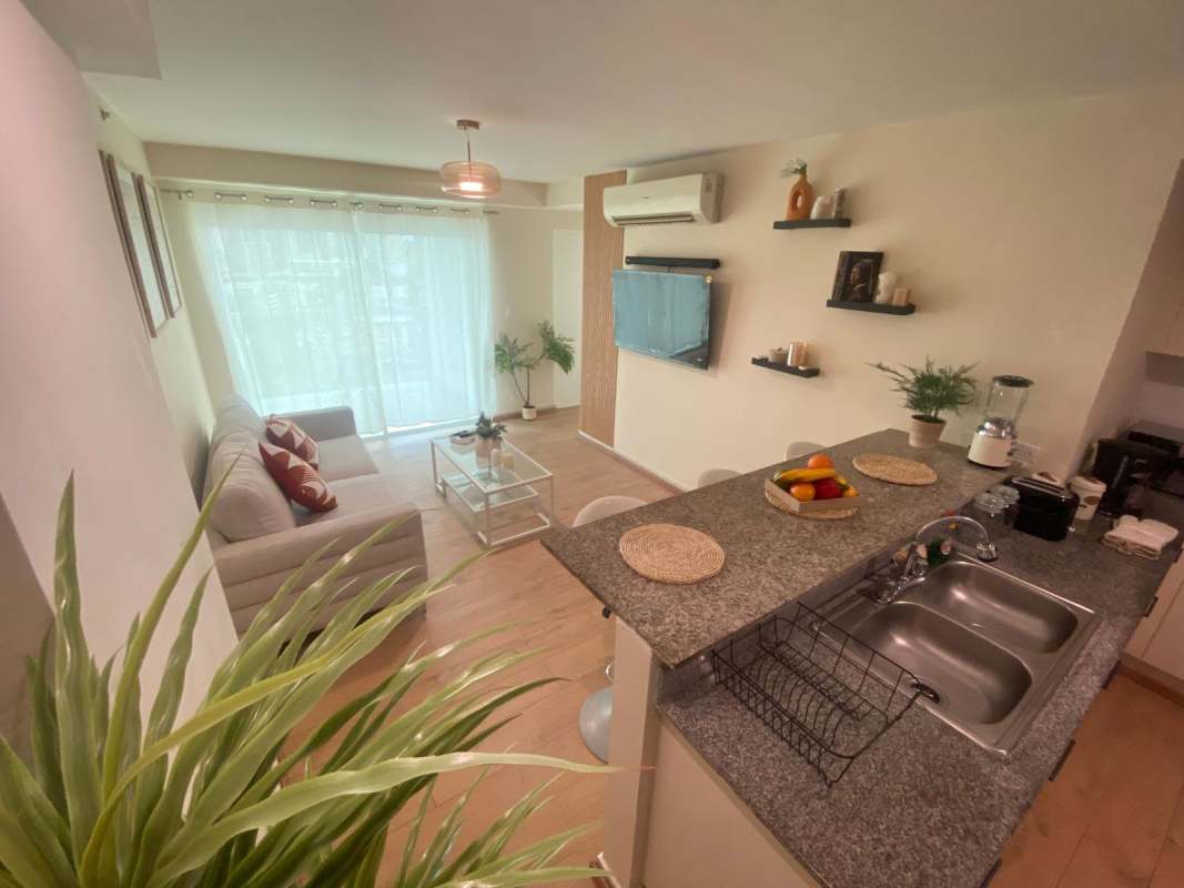 Bright bedroom with floor-to-ceiling window, AC, furnished in PH Vista Tower Obarrio Panama