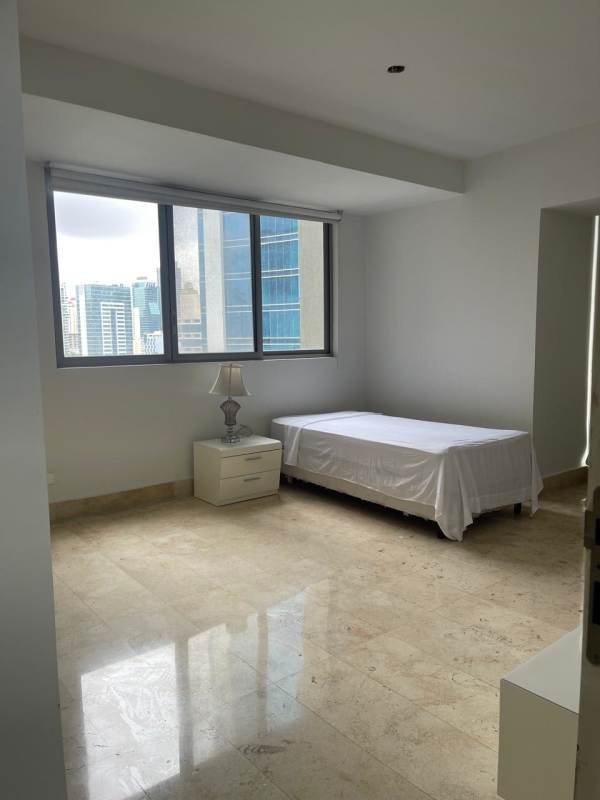 Spacious bedroom featuring panoramic sea views at PH Yoo Panama Avenida Balboa Panama City