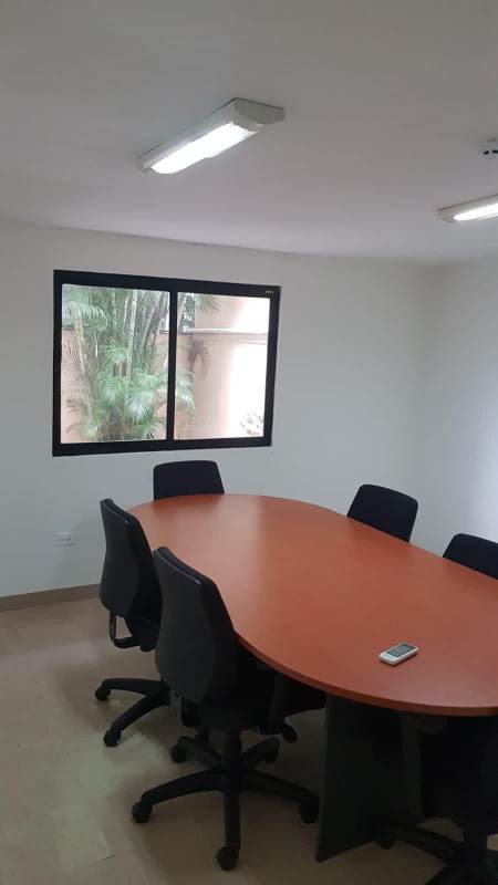 Kitchen area with stove fridge and cabinets in Panama office rental
