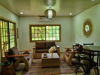 Laundry area with utility sink and washer rustic rural home for rent Chiriquí