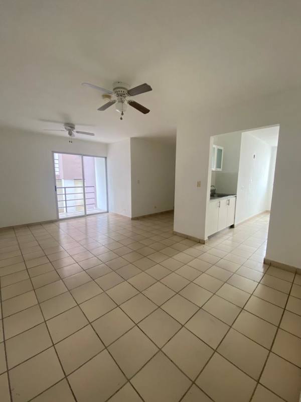 Bright living room with ceramic tile, ceiling fan, balcony access at PH Carrasquilla Place San Francisco Panama City