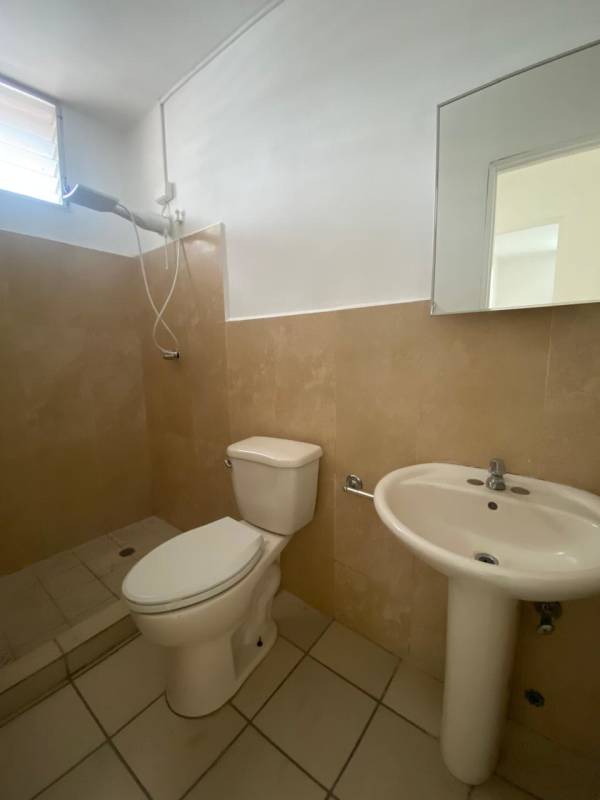 Apartment bedroom ceramic tile ceiling fan closet PH Carrasquilla Place rental Panama