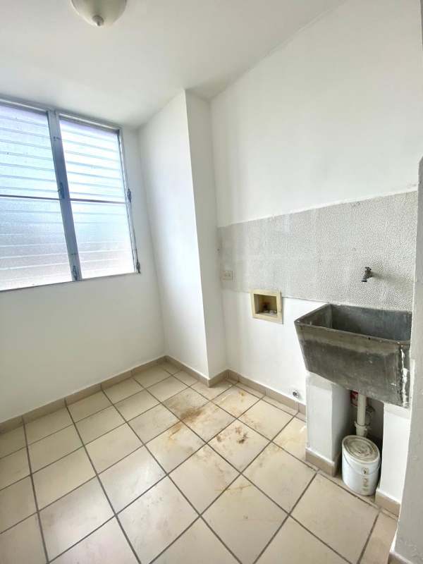 Balcony view blue accent wall overlooking parking PH Carrasquilla Place Panama apartment rental