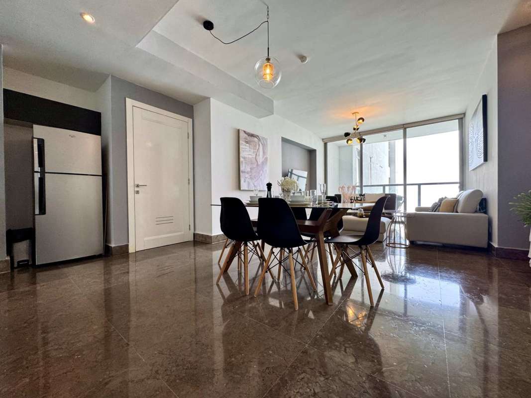 Modern bathroom with walk-in glass shower and vessel sink PH Yoo Panama