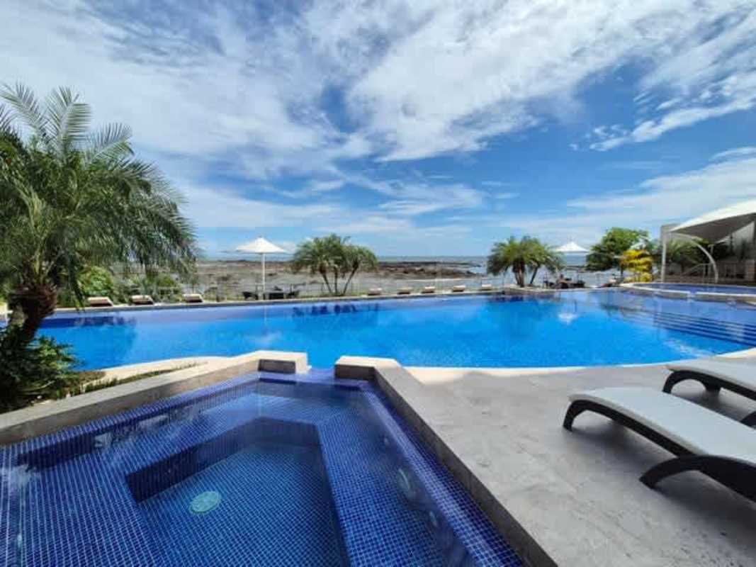 Wrap-around balcony offering panoramic sea and city views at PH Oceanaire Punta Pacifica