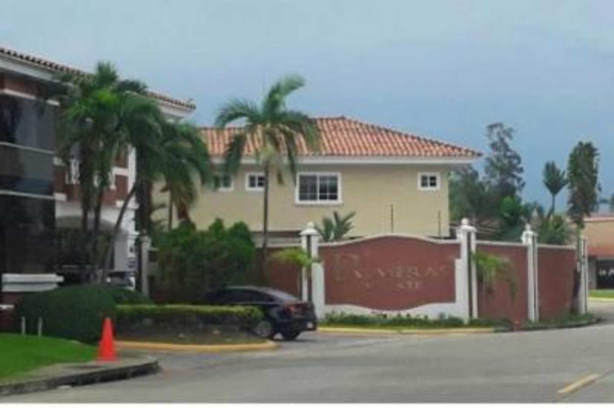 Mediterranean style facade with secured gated entrance of duplex house in Palmeras Costa del Este Panama City