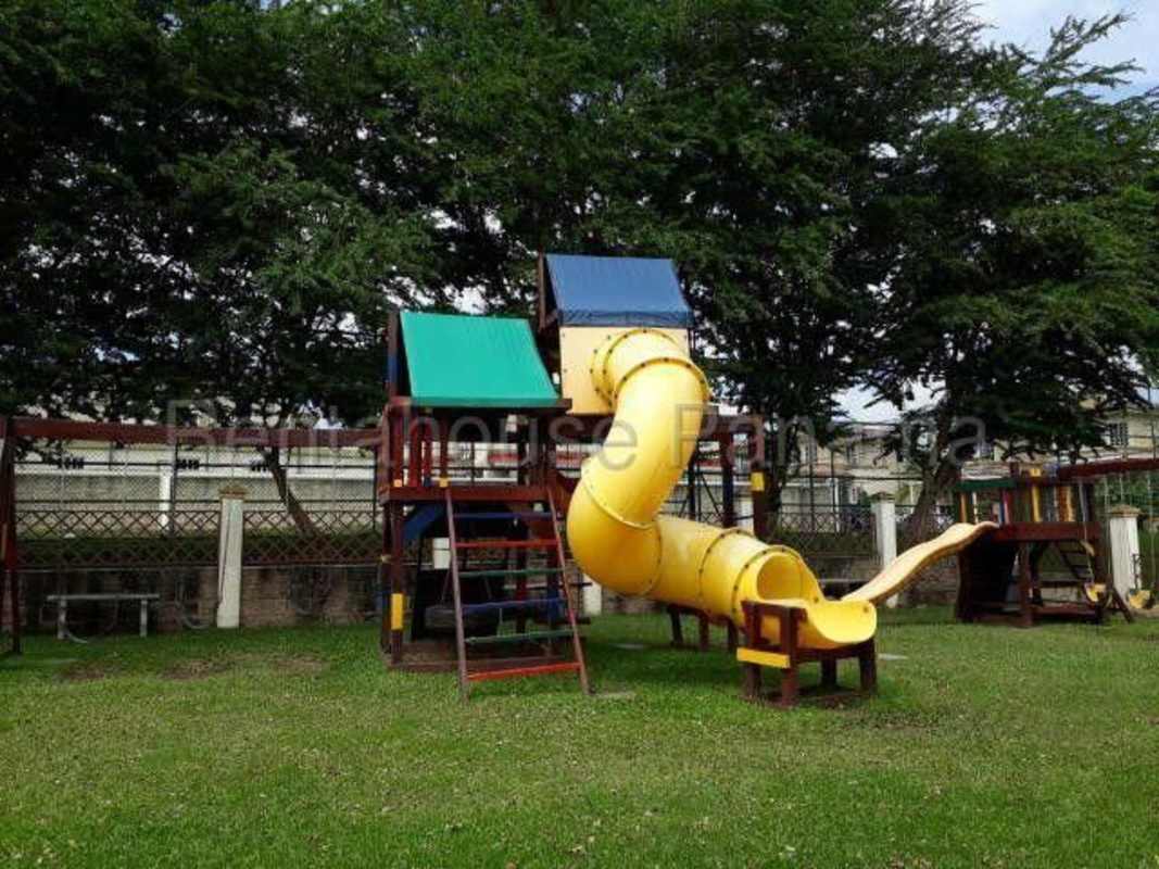 Children’s play structure with slides and garden area Dorado Springs Condado del Rey Panama