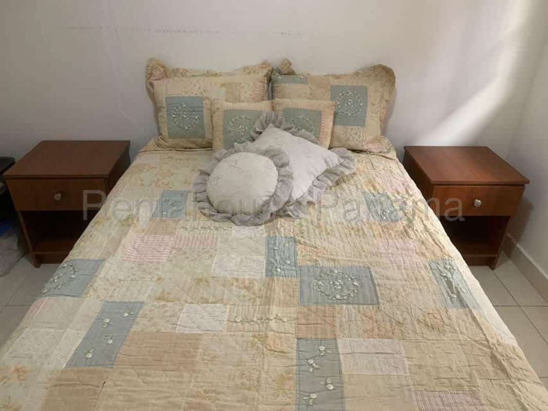 Spacious bedroom with king bed, neutral tones, window blinds in Condado del Rey