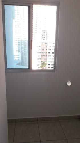 Modern high-rise exterior of PH Taurus Tower Carrasquilla Panama City skyline visible