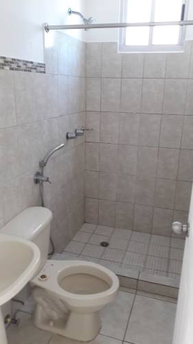Bathroom with glass-enclosed shower, granite sink counter PH Taurus Tower Carrasquilla Panama