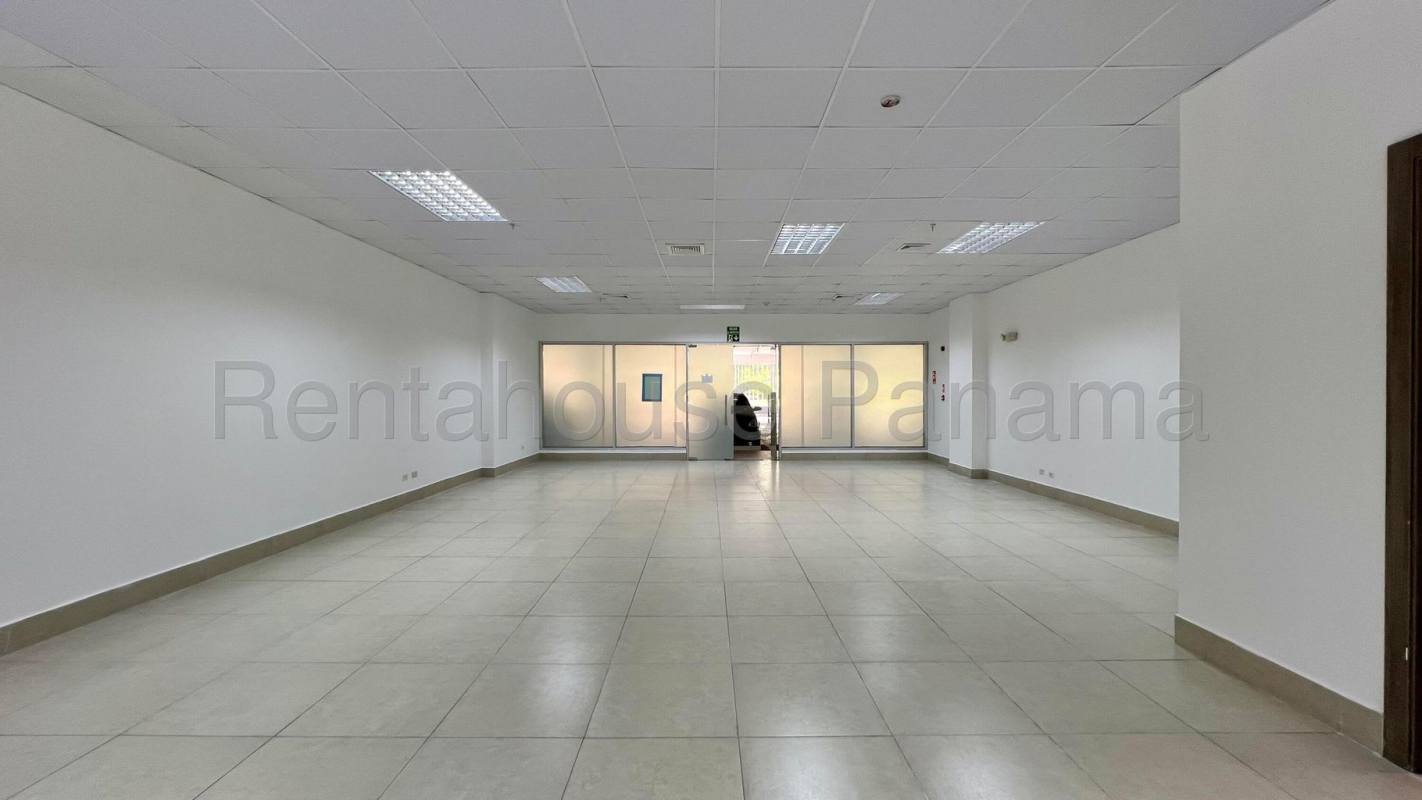 Large empty tiled open plan with suspended ceilings for retail or office use in Panama City