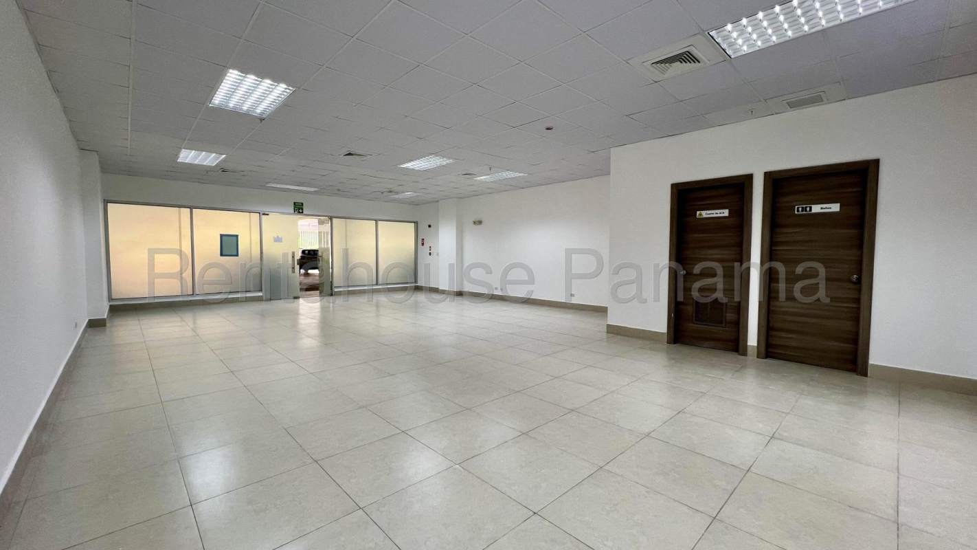 Lobby with elevators, glass walls and signage at Terrazas de Albrook Plaza Panama