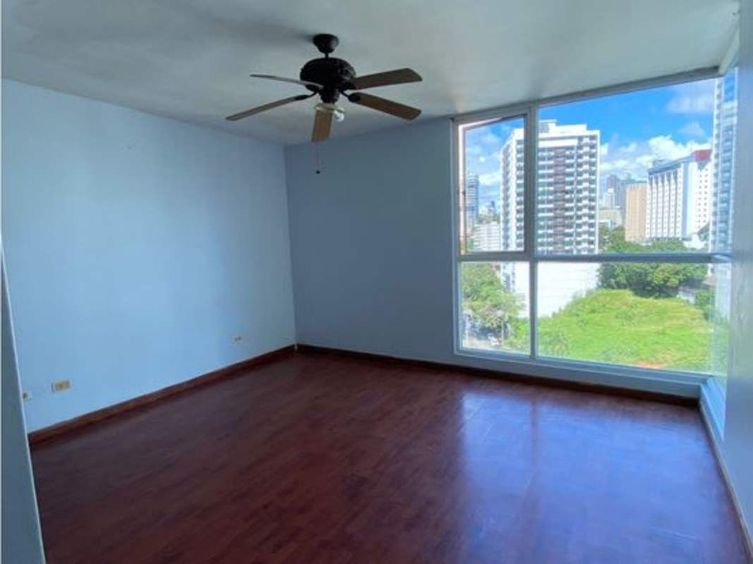 Social lounge space with pool table pink walls wood flooring PH Blue Park Bella Vista Panama