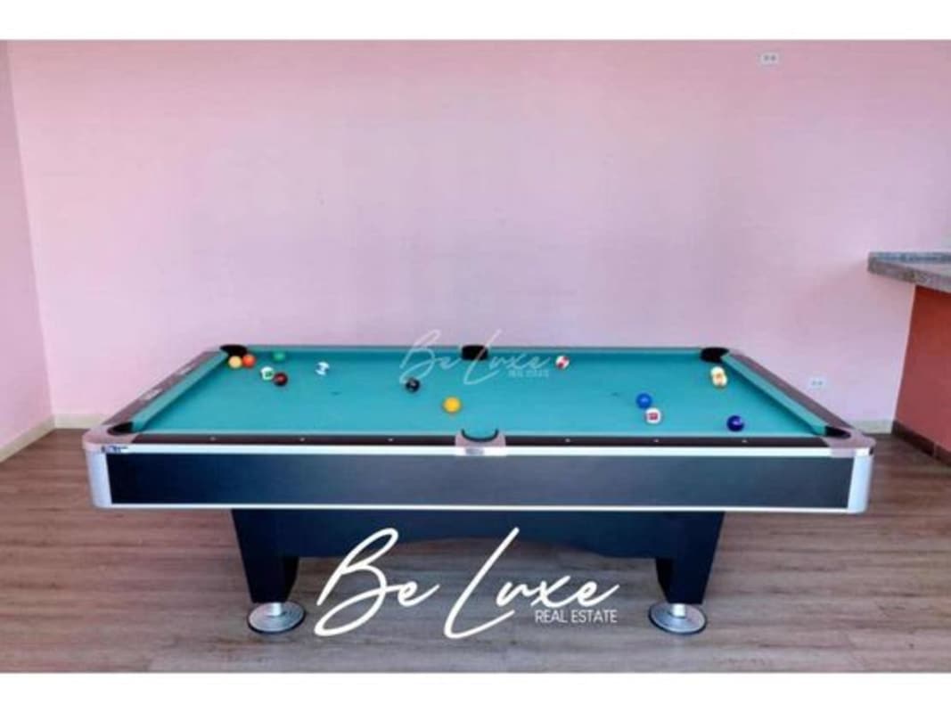 Outdoor kids play area with colorful murals swings slide PH Blue Park Bella Vista