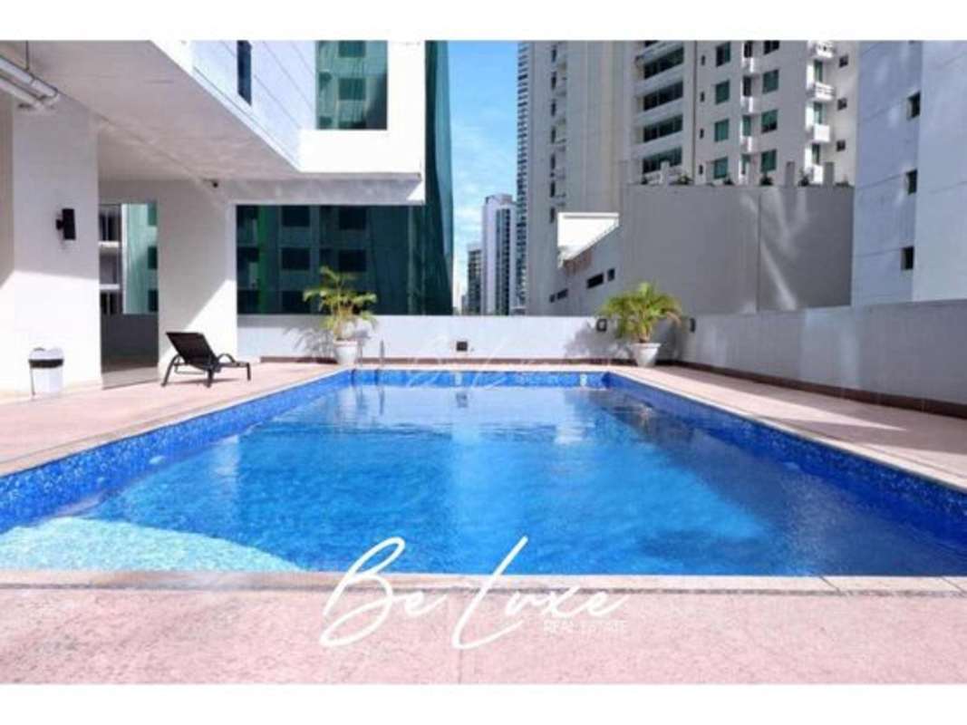 Rooftop swimming pool with sun deck and city skyline views PH Blue Park Panama City