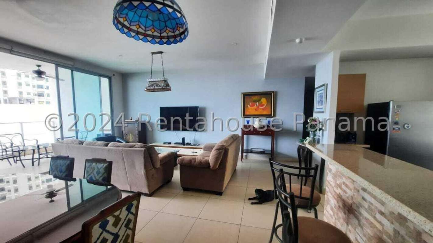 Kitchen with granite counters, breakfast bar, and stainless appliances in PH Dupont Tower Apartment Panama
