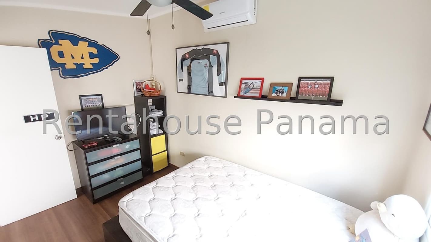 Covered patio and private garden with decorative wall and ambient lights in La Fontana Chanis Panama