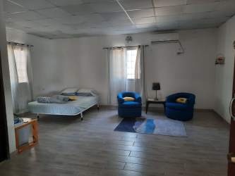 Bright open living dining area with tile floors country home Panama Oeste