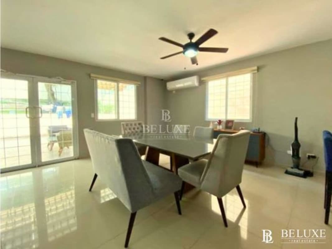 Private backyard with mature tree and landscaped garden Residencial El Doral Panama