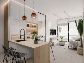 Open-plan kitchen and living area with balcony ocean view Panama