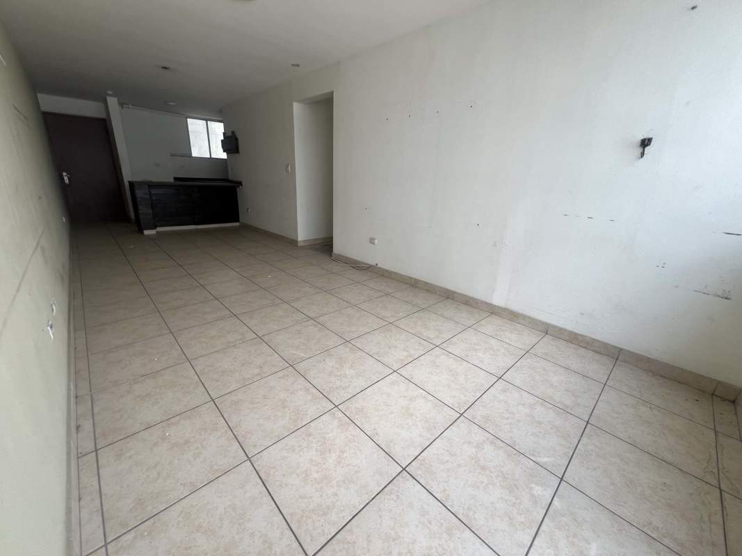 Bathroom with tiled walls, shower and pedestal sink in PH Plaza Valencia Carrasquilla Panama City