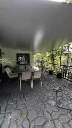 Outdoor covered patio with dining space and mountain views Panama