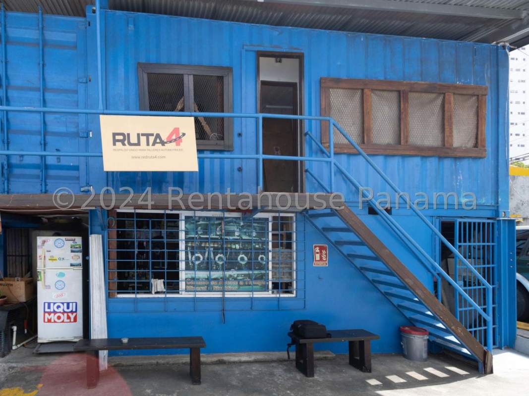 Two-story converted shipping container office on commercial lot in San Francisco Panama