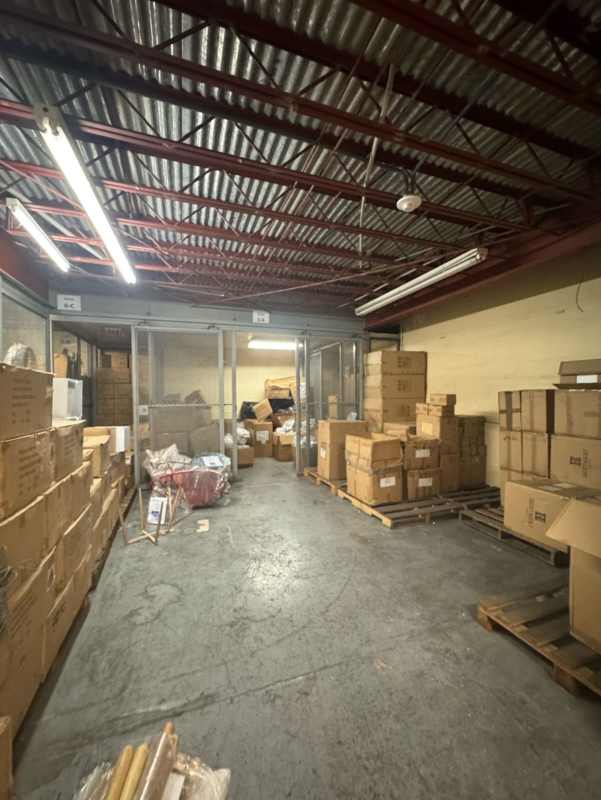 Warehouse industrial storage section with metal partition cages for secure inventory in Panama
