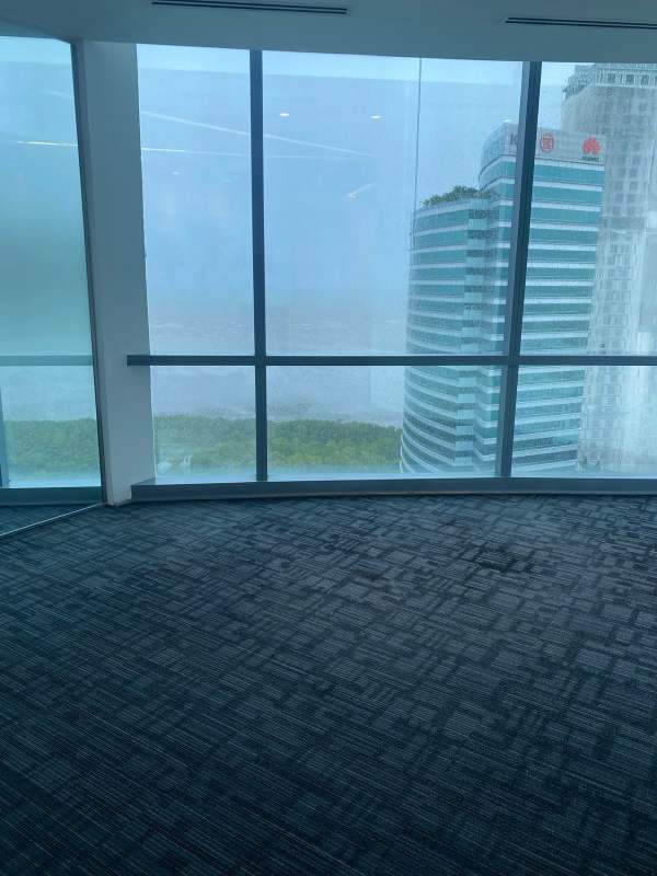 Bright open-plan office space with large glass windows in Financial Park Tower Costa del Este Panama