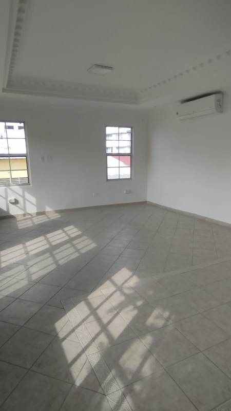 Side view of duplex house with garage and garden for sale in Betania Panama