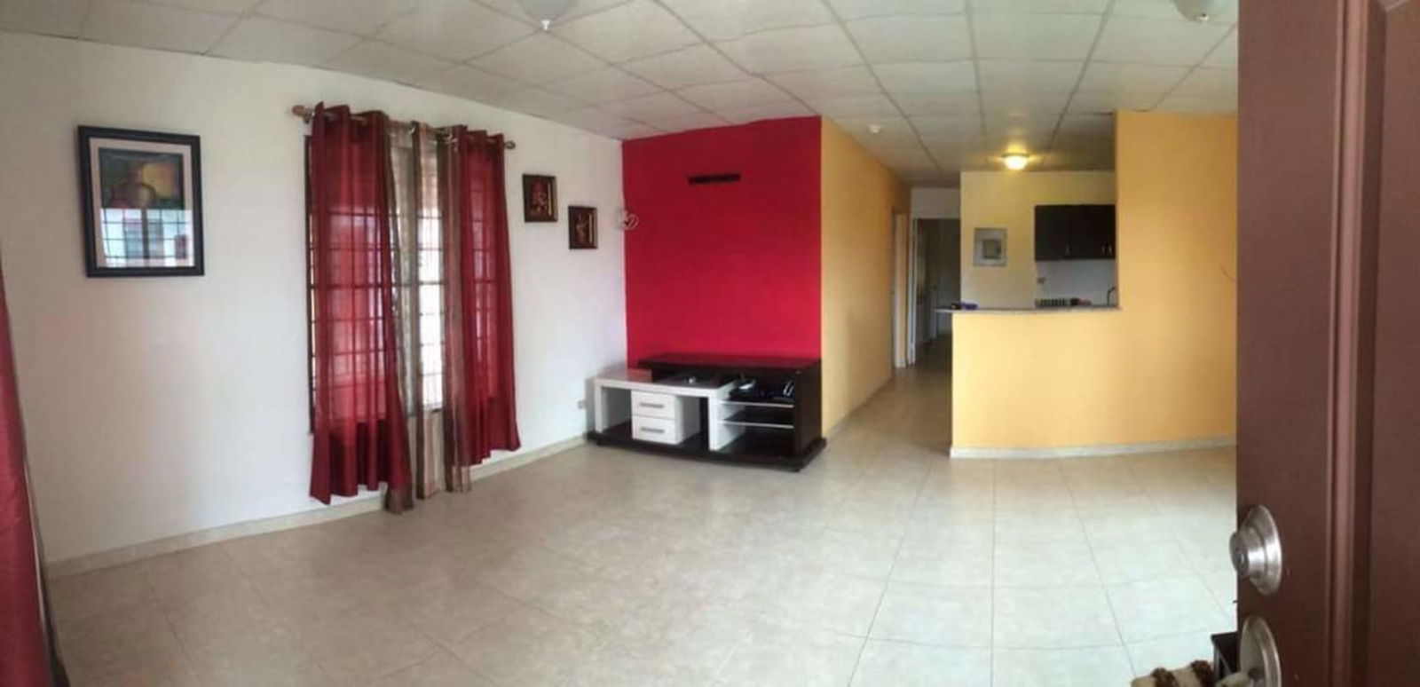 Bedroom with ceramic tile floors, window with curtain, neutral paint PH Valle del Lago Las Cumbres