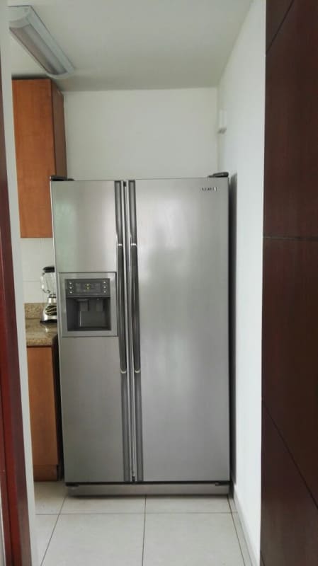 Furnished master bedroom with walk-in closet in apartment PH Costa del Mar San Francisco Panama