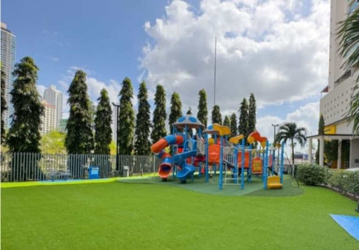 Modern kitchen with granite counters and stainless steel fridge PH Costa del Mar San Francisco Panama