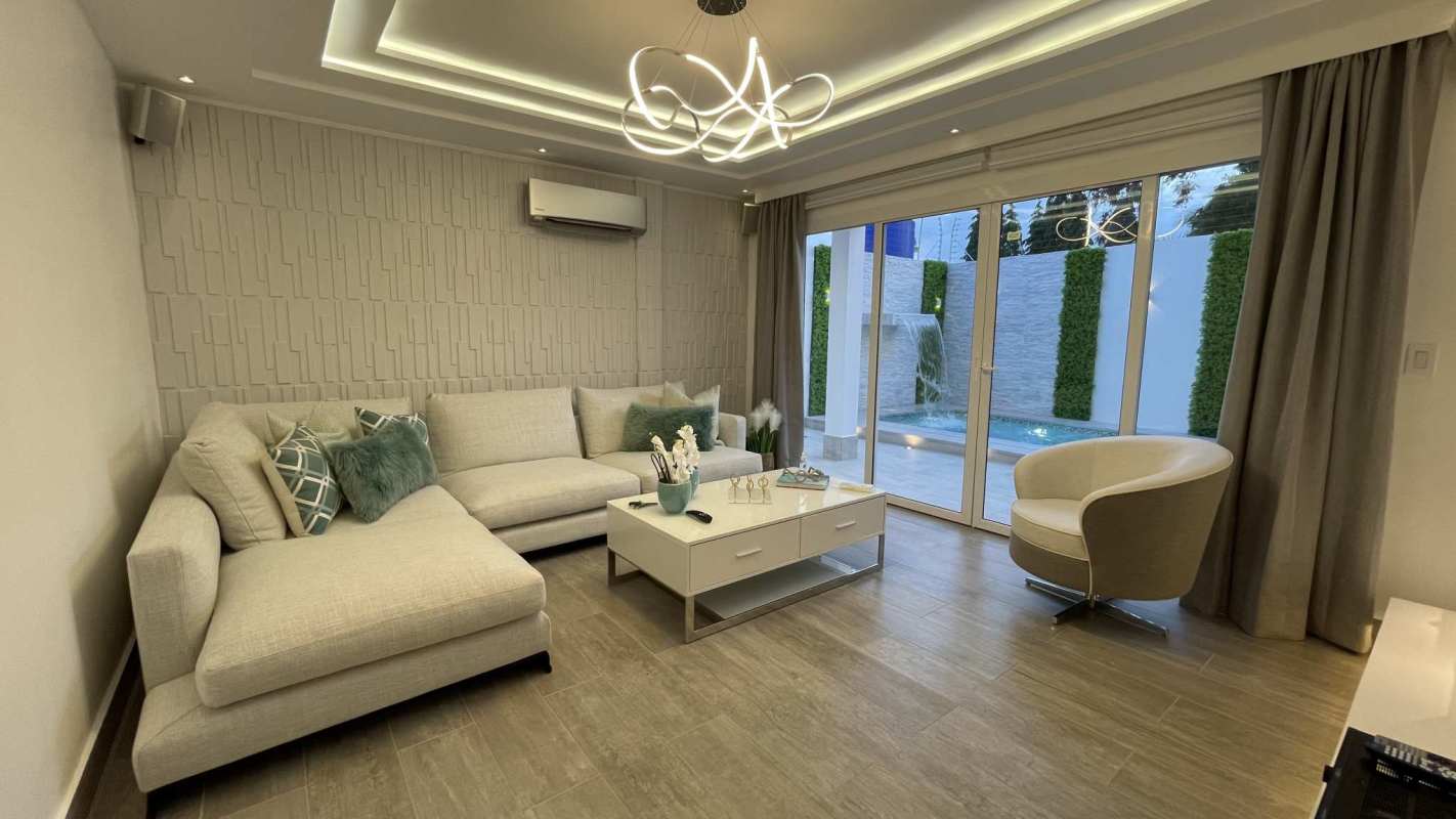 Spacious gourmet kitchen with marble island and modern appliances in luxury house for sale Hato Pintado Panama