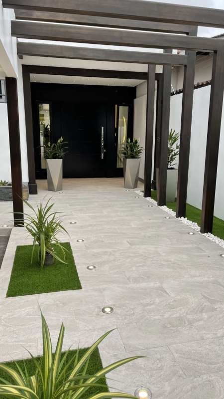 Modern open floor plan luxury house double height ceiling dining living room Panama City Hato Pintado