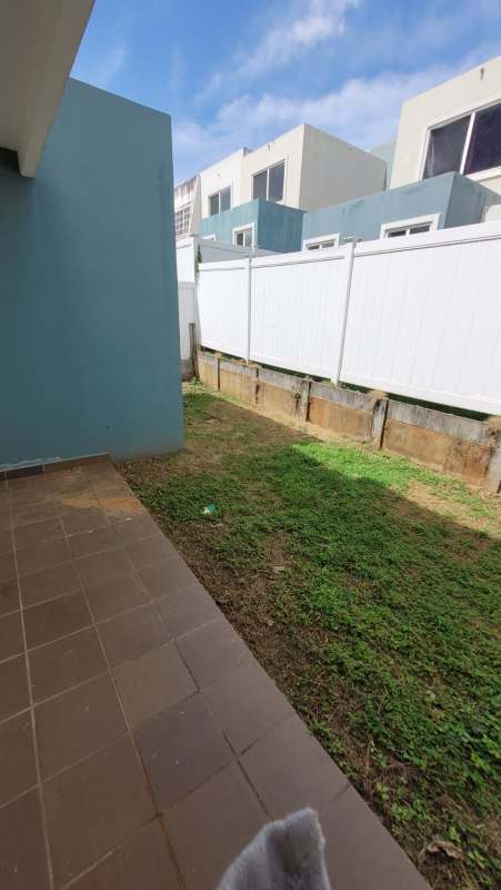 Laundry area with utility sink tiled floor window Alpes Brisas del Golf Panama rental