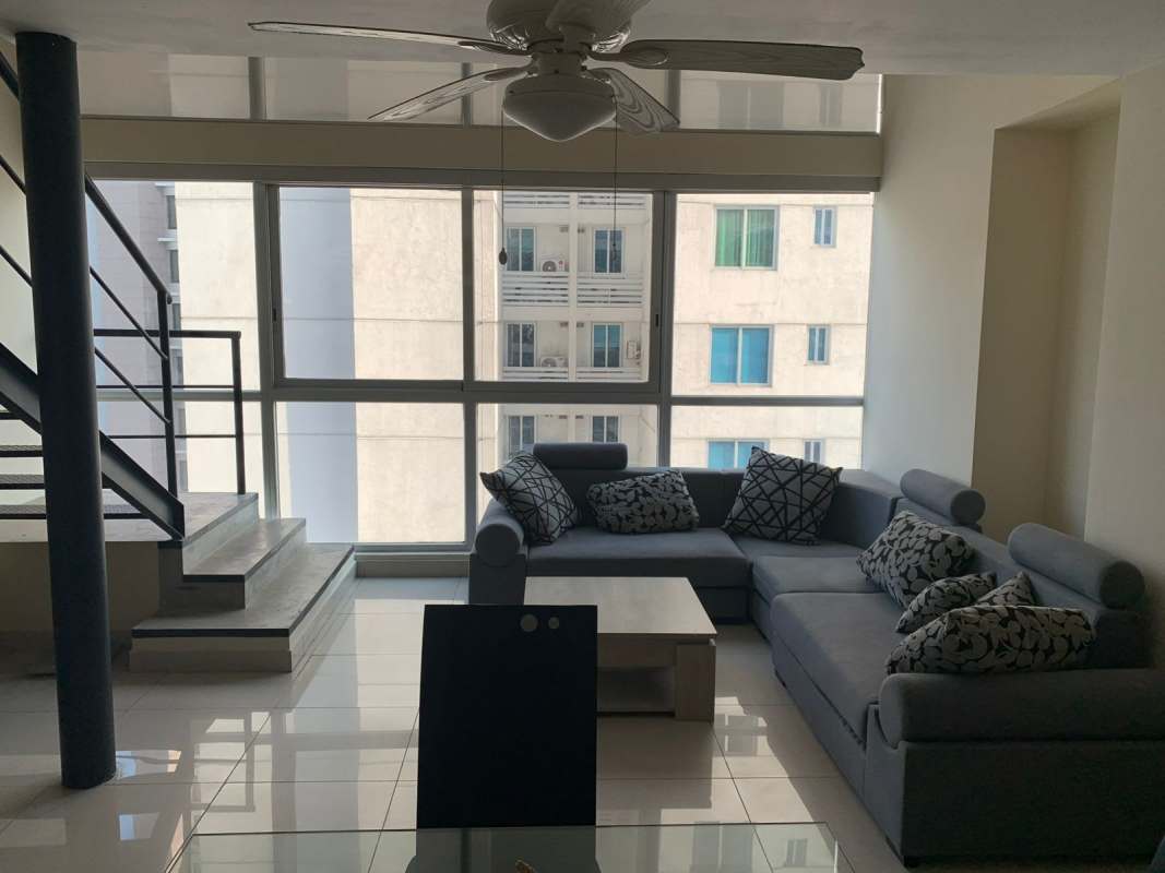 Spacious living room with large windows city view PH Vitro Loft El Cangrejo Panama