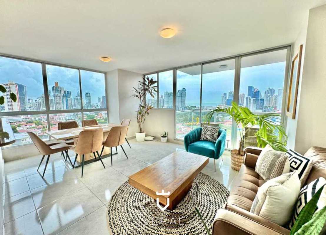 Modern living room with city views and natural light in PH Oasis Tower Via Porras