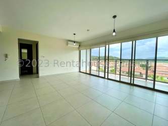 Covered balcony overlooking lush green areas at Woodlands Panama Pacifico