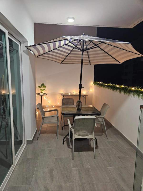 Contemporary kitchen with granite breakfast bar, appliances, stool seating in PH 43 GV Bella Vista Panama City