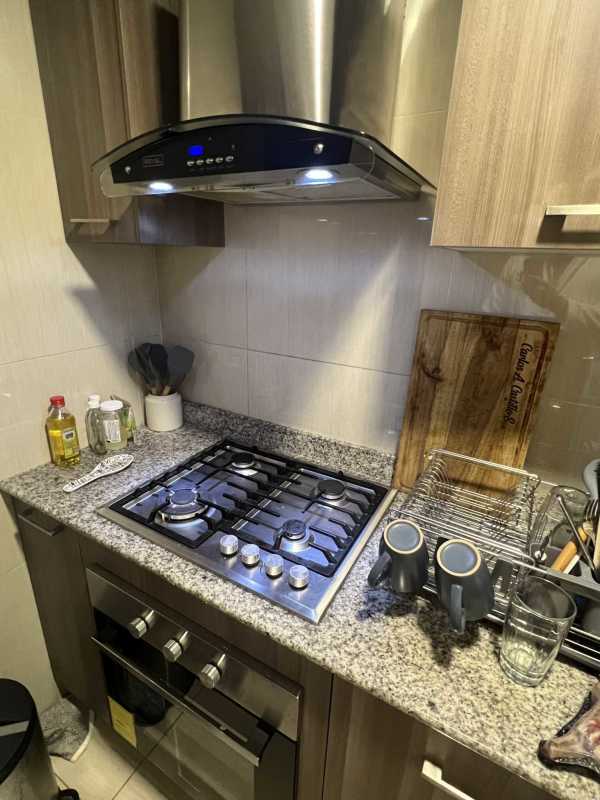 Compact modern kitchen with gas stove, hood, granite counters PH 43 GV Panama rental