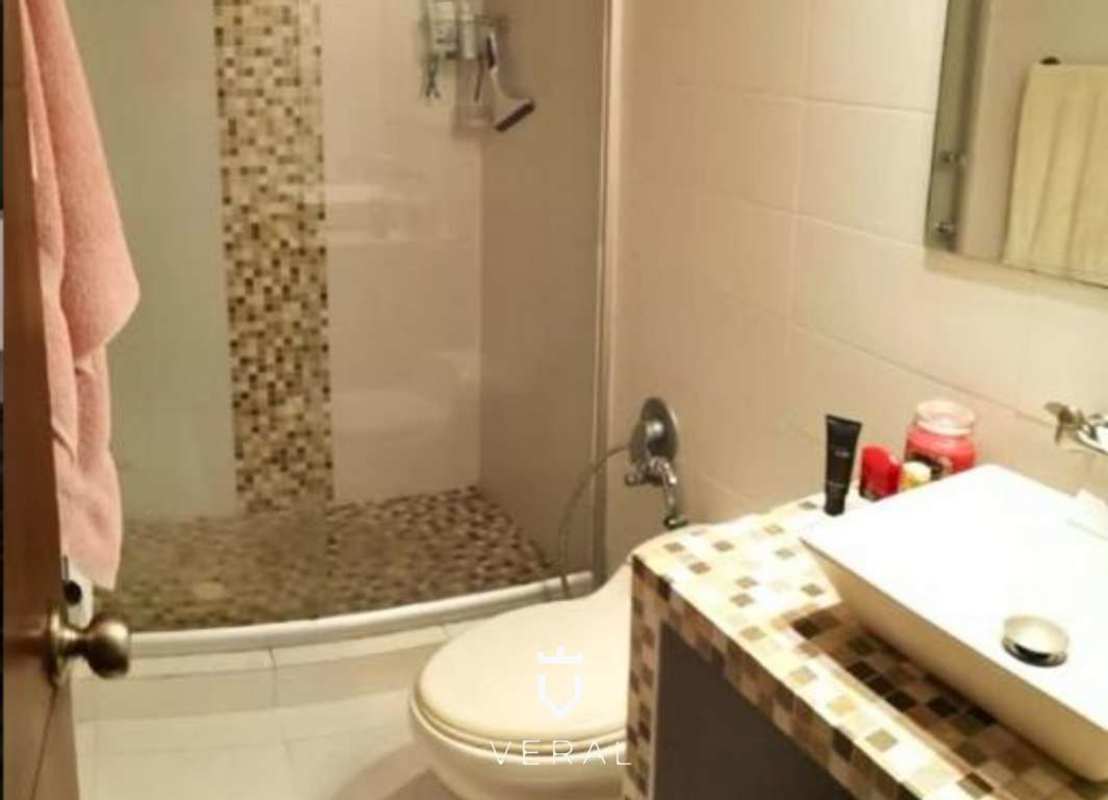 Contemporary bathroom with mosaic tiled walk-in shower and vessel sink PH Terramar Panama