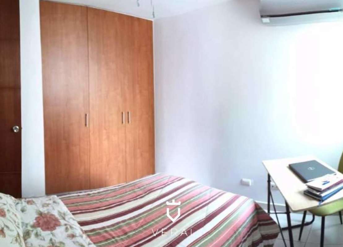 Contemporary bedroom with wardrobe, AC unit, modern decor PH Terramar Panama