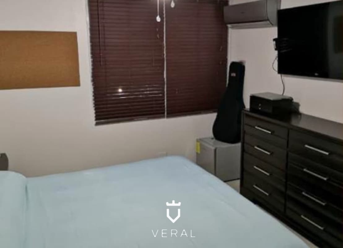 Bedroom with city view window and AC PH Terramar Panama City